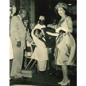Queen Elizabeth II and Prince Philip Looking at Boa - Vintage Photograph  