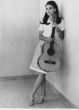 The Italian Actress Nicoletta Machiavelli with a guitar