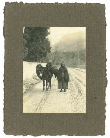 The Old Days - Woman on the Snowy Road
